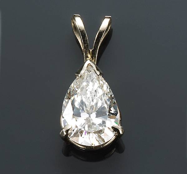 Appraisal: A diamond pendant centering a pear-shaped diamond weighing approximately carats