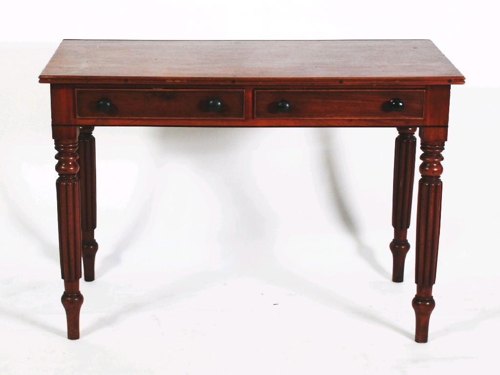 Appraisal: WILLIAM IV MAHOGANY WRITING TABLE the moulded oblong top above