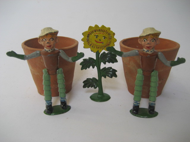 Appraisal: A 's Lucas metal set of two Flower Pot Men