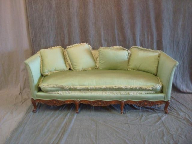 Appraisal: Louis XV style green upholstered down-filled sofa possibly silk From