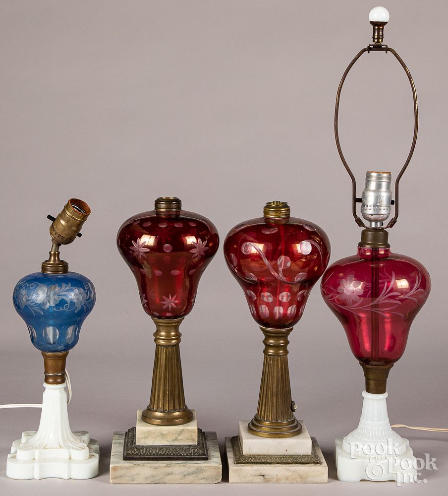 Appraisal: Four cut to clear glass fluid lamps Four cut to