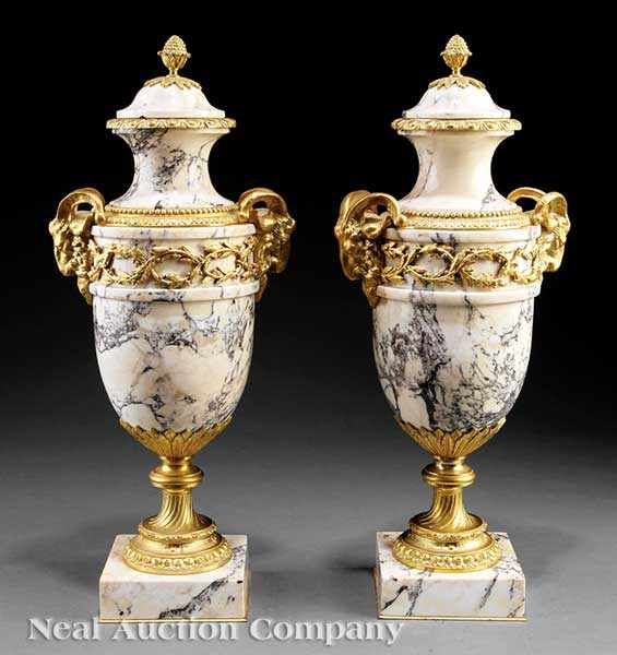 Appraisal: A Pair of Empire-Style Marble and Gilt Bronze Cassolettes fruit