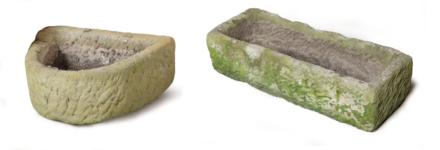 Appraisal: TWO STONE TROUGHS American th century Rough hewn with deep