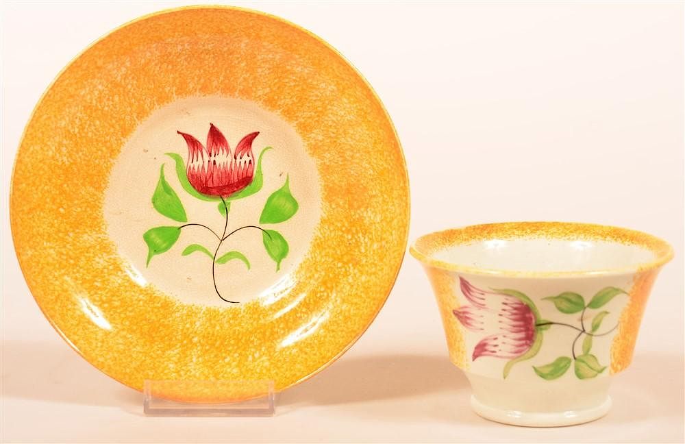 Appraisal: Yellow Spatter China Tulip Cup and Saucer Yellow Spatter China