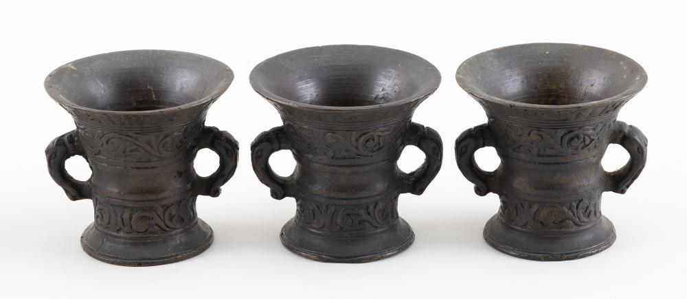 Appraisal: THREE FLEMISH TH CENTURY-STYLE BRONZE MORTARS HEIGHTS DIAMETERS AT RIM