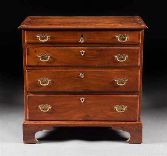 Appraisal: George III banded mahogany bachelor's chest circa four graduated drawers