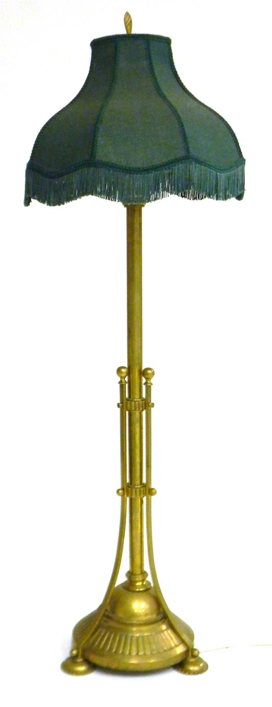 Appraisal: Victorian brass floor lamp cylindrical shaft joined at mid-point by