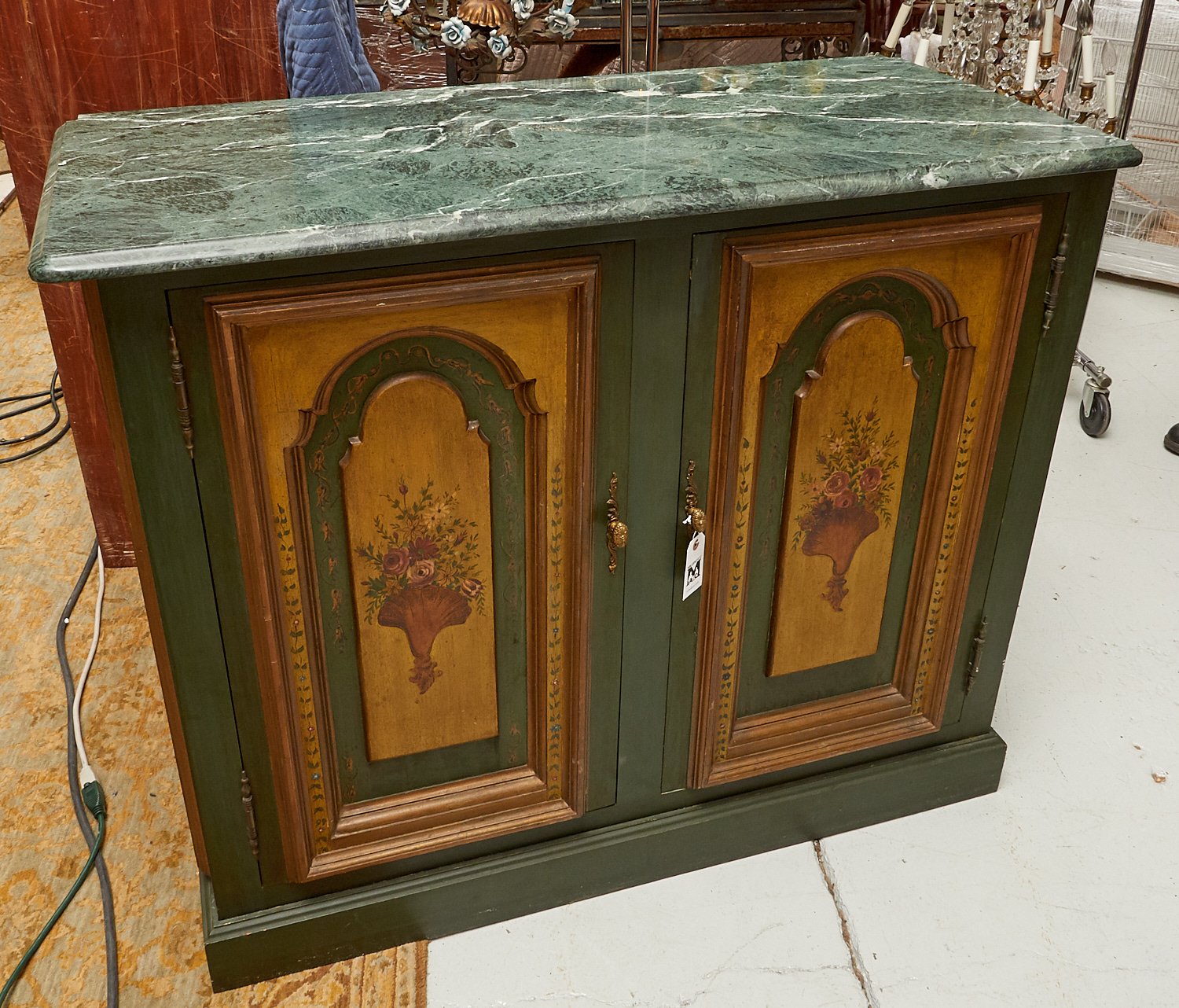 Appraisal: ITALIAN PAINT DECORATED MARBLE TOP CABINET th c with floral