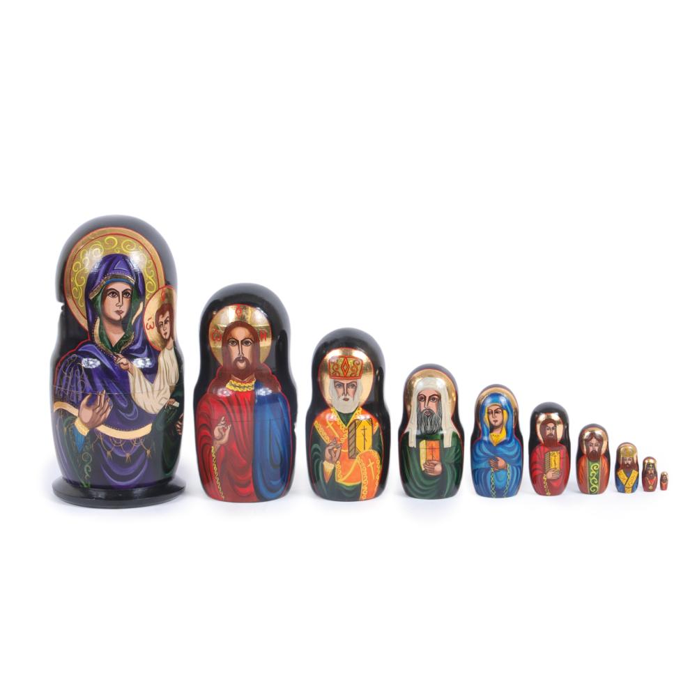 Appraisal: NINE RUSSIAN NESTING DOLLS WITH HAND PAINTED GILT WOOD RELIGIOUS