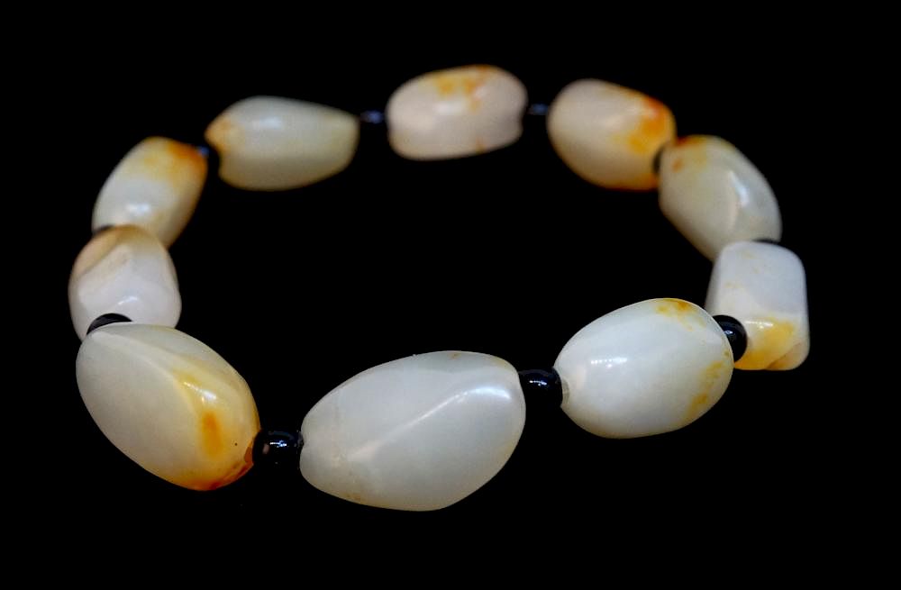 Appraisal: Jade Pebble Bracelet Jade Pebble Bracelet Description A white jade