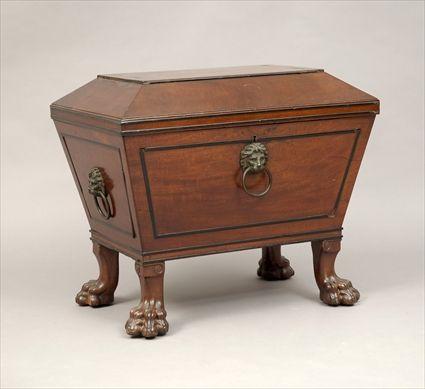 Appraisal: Regency-Style Part-Ebonized Inlaid and Carved Mahogany Sarcophagus-Form Cellaret x x