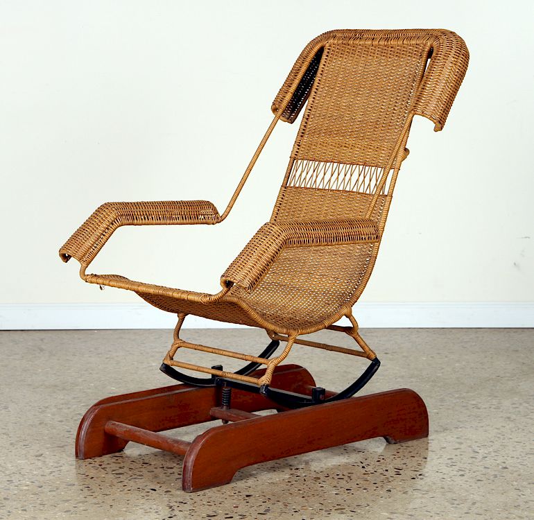 Appraisal: MODERN WICKER PLATFORM ROCKER ON IRON WOOD BASE A wicker