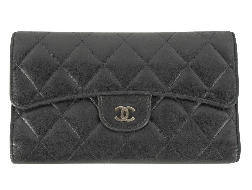 Appraisal: CHANEL TRIFOLD WALLETcirca - black leather with serial sticker interior