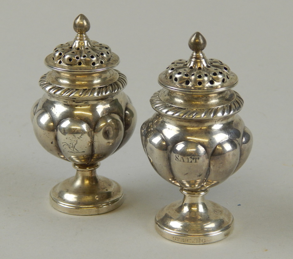 Appraisal: A pair of American Sterling silver salt and pepper shakers