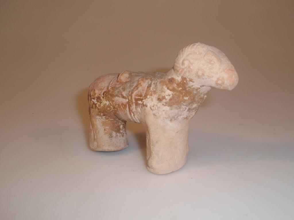 Appraisal: A heavily restored ancient terracotta zoomorphic figurine of a ram