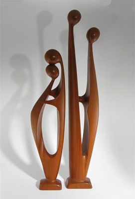 Appraisal: A Danish rosewood sculpture designed by Simon modelled as two