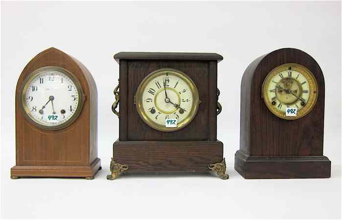 Appraisal: THREE AMERICAN MANTEL CLOCKS Seth Thomas arch-top mahogany Ansonia round-top