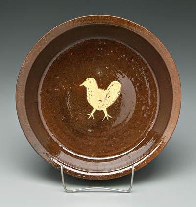 Appraisal: Ben Owen chicken pie dish interior with slip decorated chick