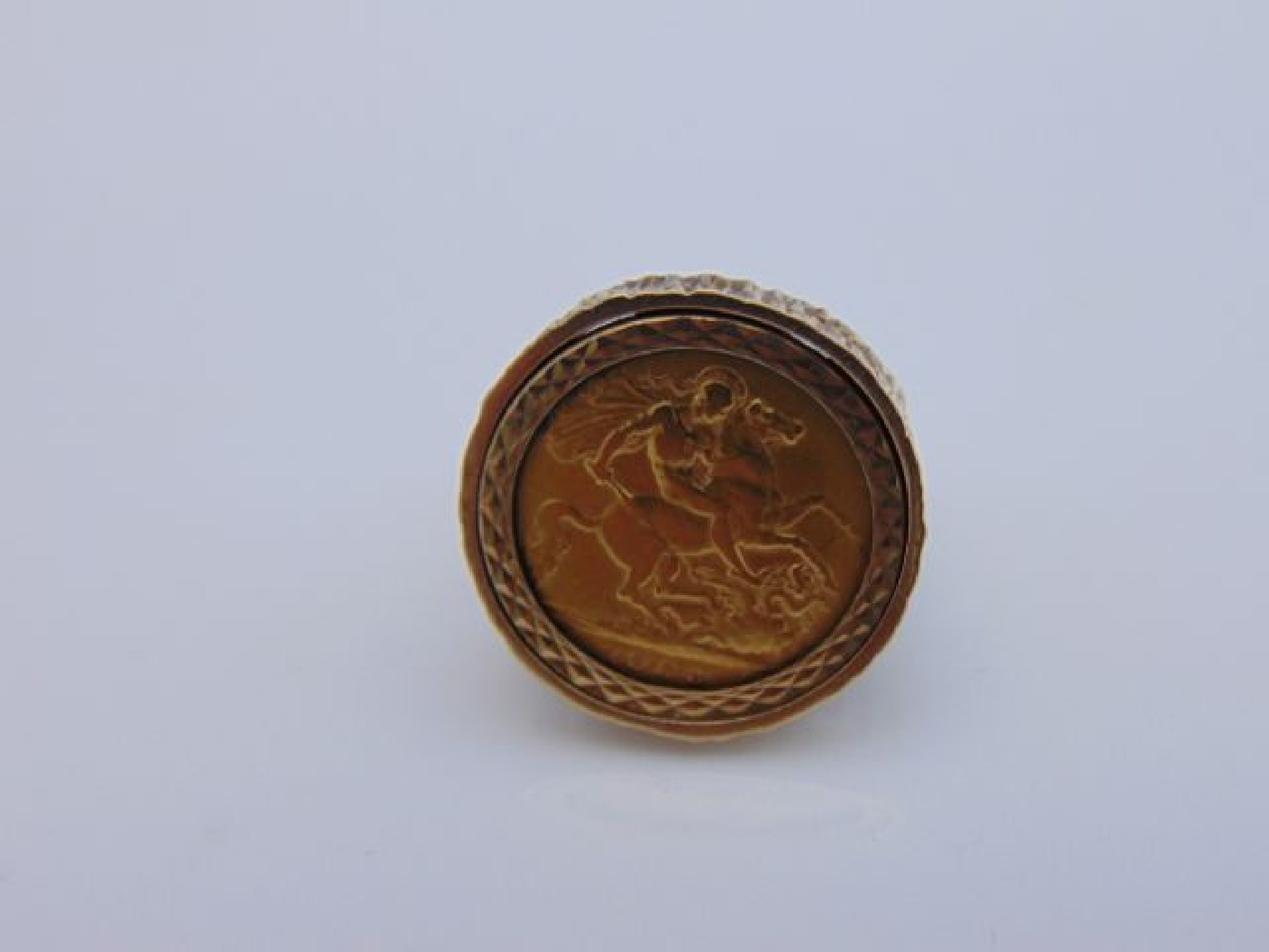 Appraisal: A half sovereign inset ring the ct gold band of