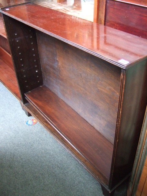 Appraisal: A pair of th century floor standing open bookcases each