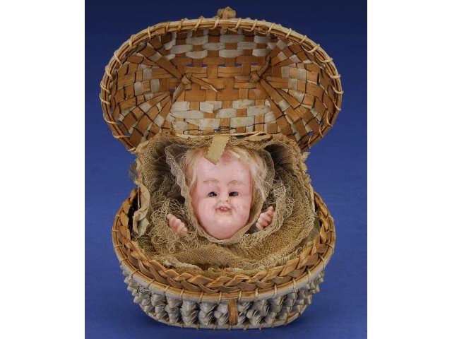 Appraisal: Basket with Wax Baby Germany ca fine quality basket containing