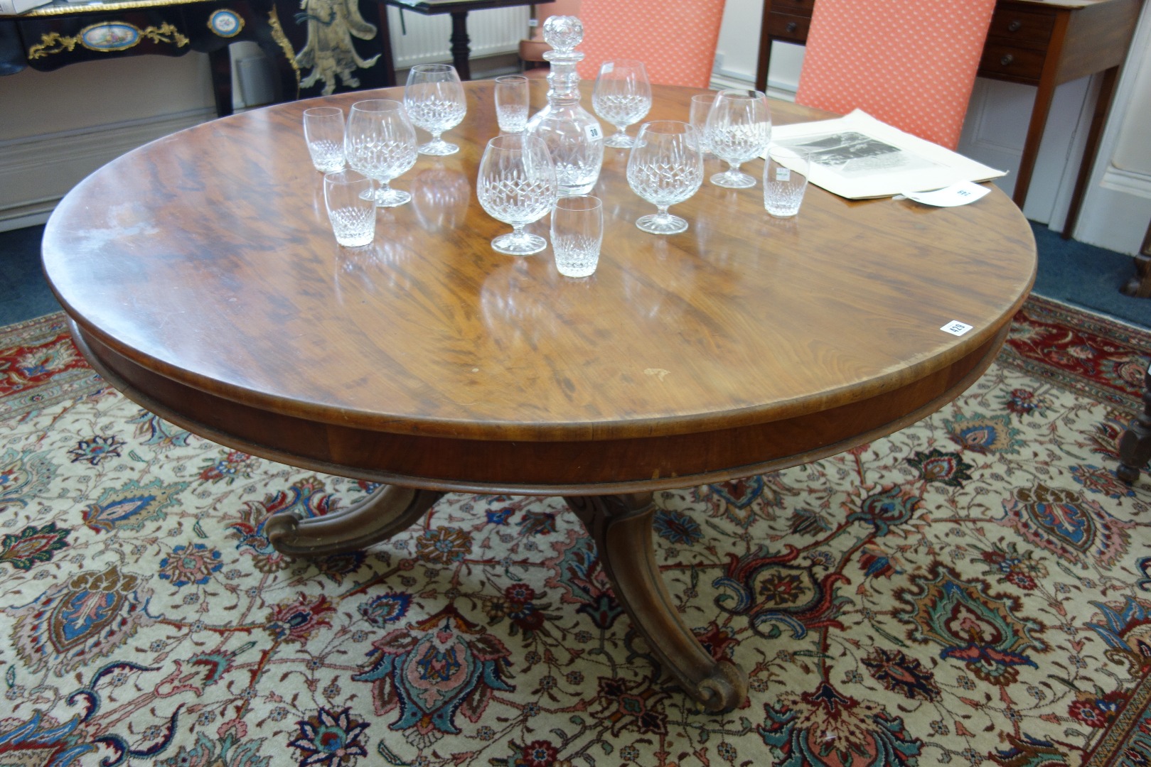 Appraisal: An early Victorian mahogany breakfast table the circular tilt-top on