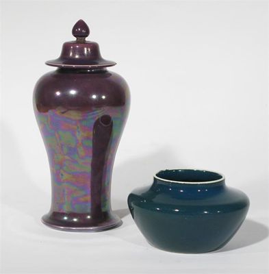 Appraisal: A Ruskin Pottery vase and cover shouldered form covered in