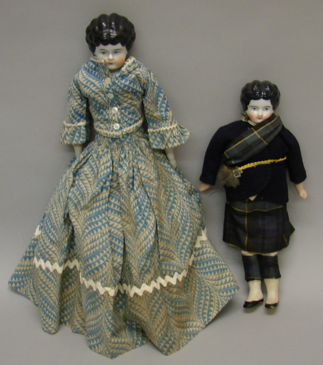 Appraisal: Pair of Lowbrows with black hair Doll dressed as a