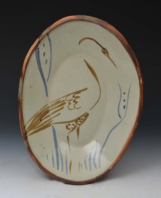 Appraisal: Michael Cardew British - Dish painted with a wading bird