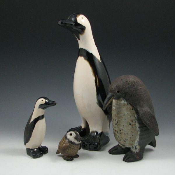 Appraisal: Lot of four pottery penguins including a mother and chick