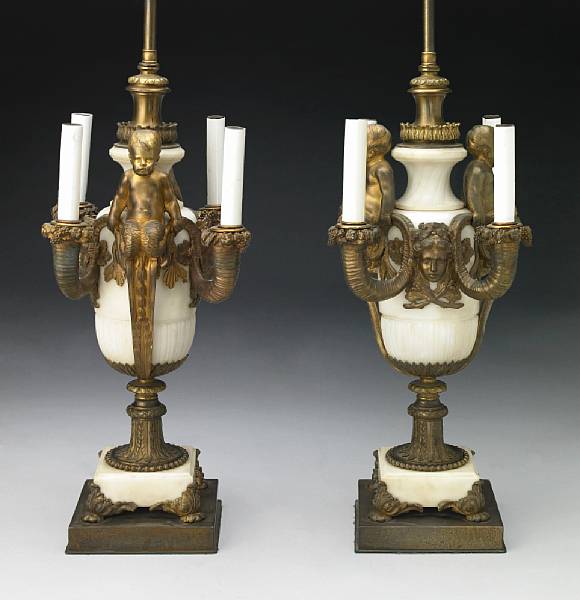 Appraisal: A pair of Louis XVI style gilt bronze mounted marble