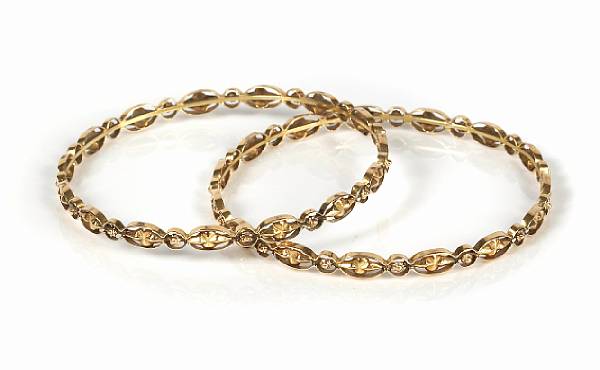 Appraisal: A pair of k gold bangles gr