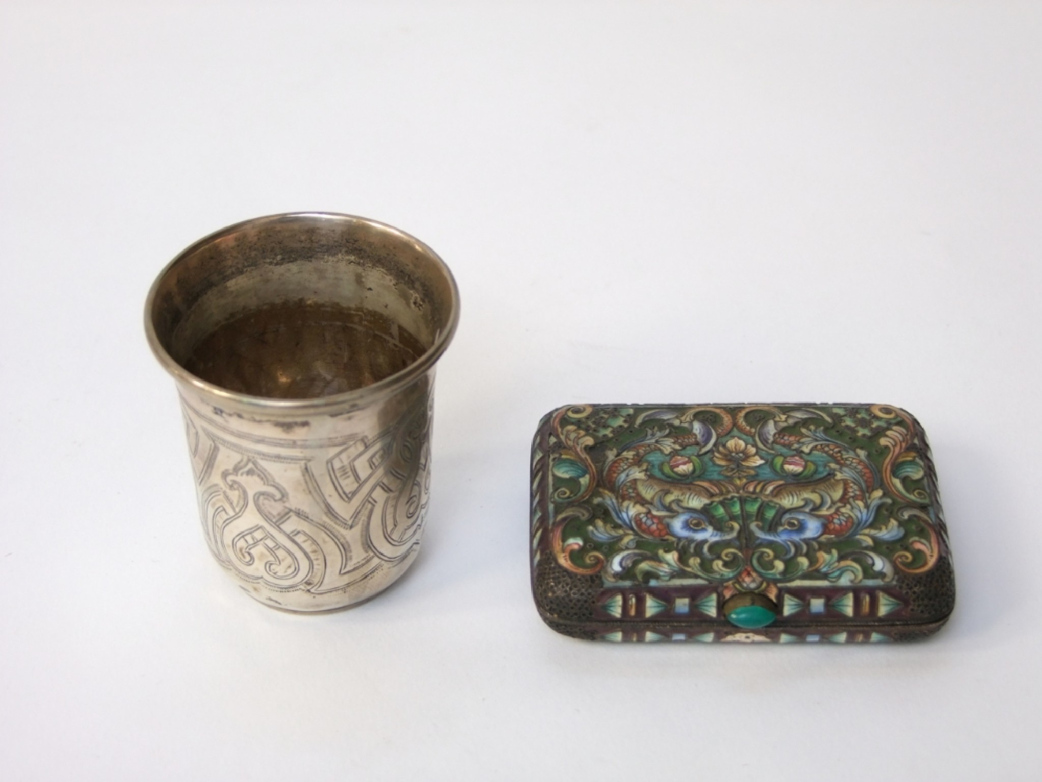 Appraisal: A Russian silver beaker of flared form with engraved geometric