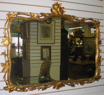 Appraisal: AN AMERICAN GILT WOOD AND GESSO WALL MIRROR The frame