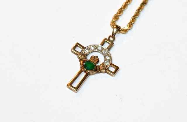 Appraisal: A DIAMOND AND EMERALD PENDANT CROSS heart shaped emerald mounted