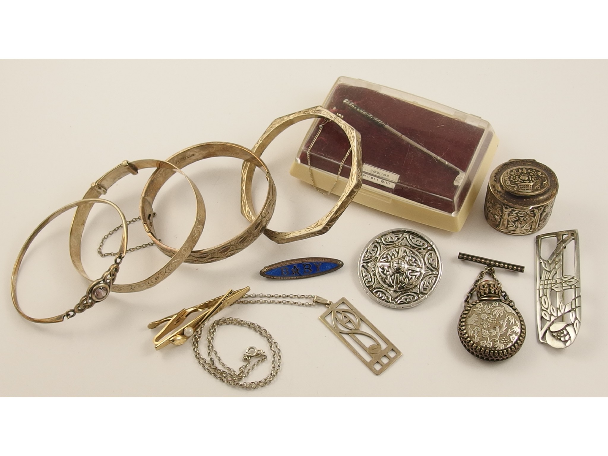 Appraisal: Four silver bangles a silver trinket box and other items