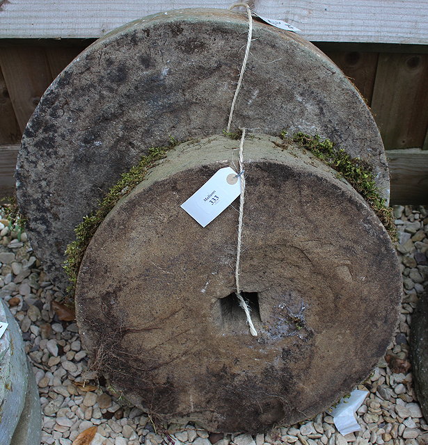 Appraisal: TWO OLD GRINDING STONES the largest cm diameter