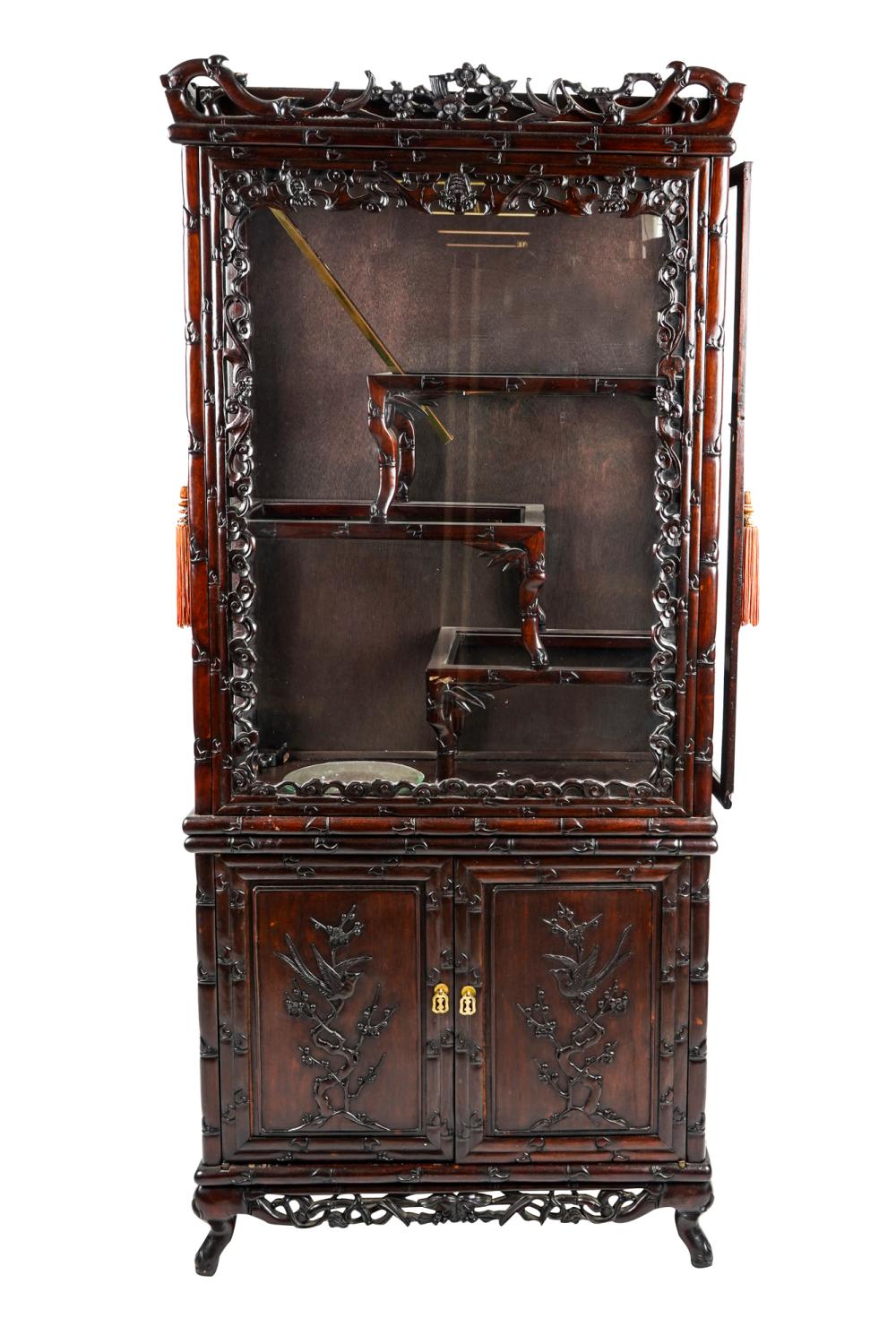 Appraisal: CHINESE STYLE DISPLAY CABINETlate th century with glazed fixed front