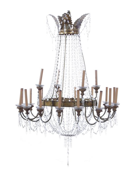 Appraisal: Empire style gilt-metal and crystal twenty-light chandelier leaf-form top band