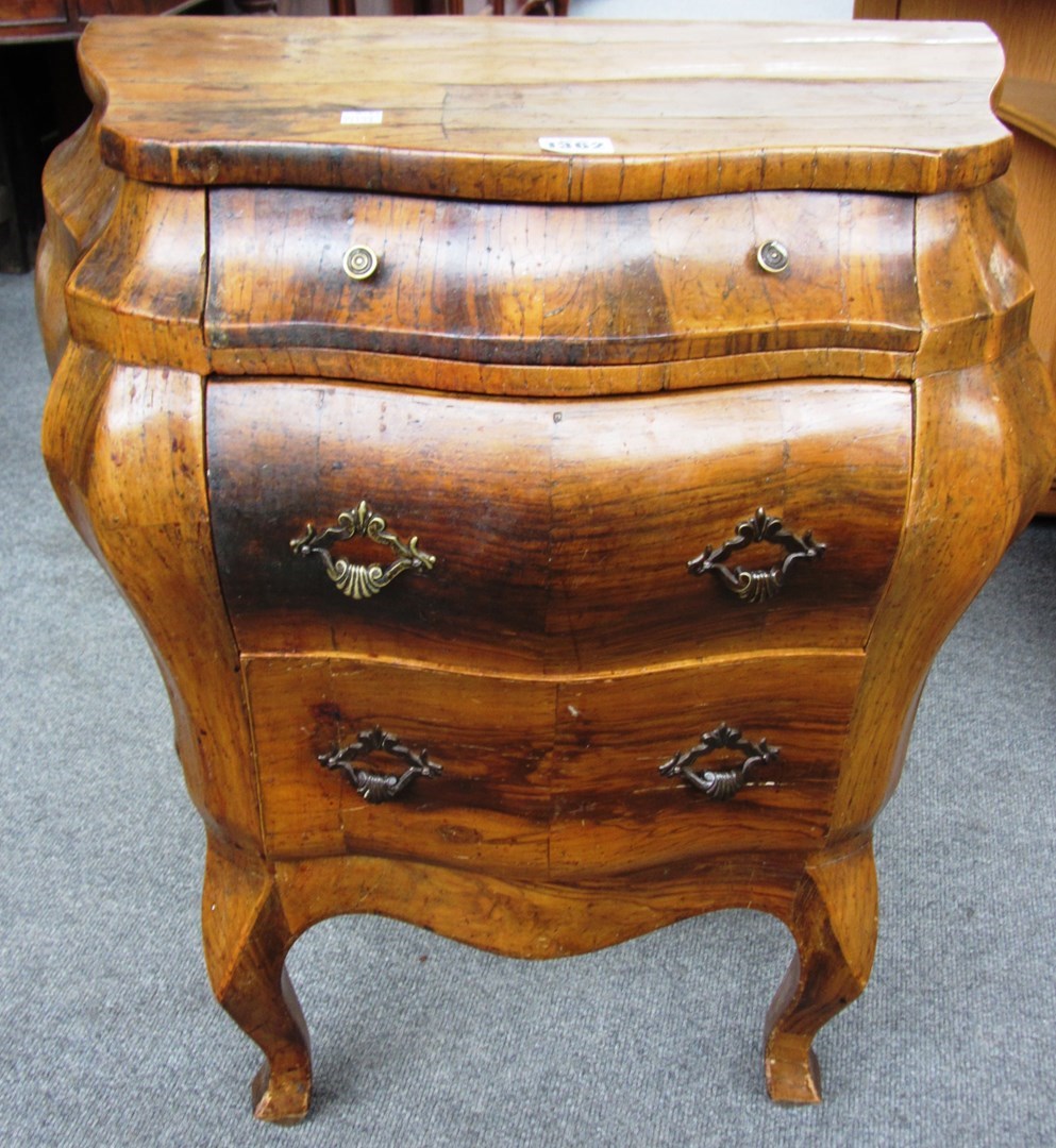 Appraisal: An th century style miniature olive wood bombe three drawer