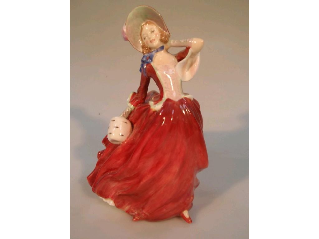 Appraisal: A Royal Doulton figure 'Autumn Breezes' HN cm high