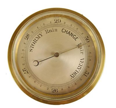 Appraisal: A brass cased bulkhead barometer with a in silvered dial