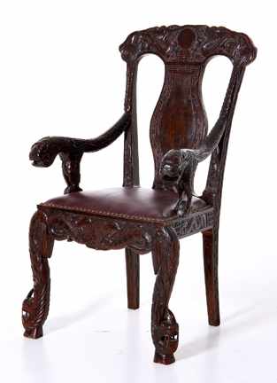 Appraisal: Oriental carved hardwood armchair late th early th century carved