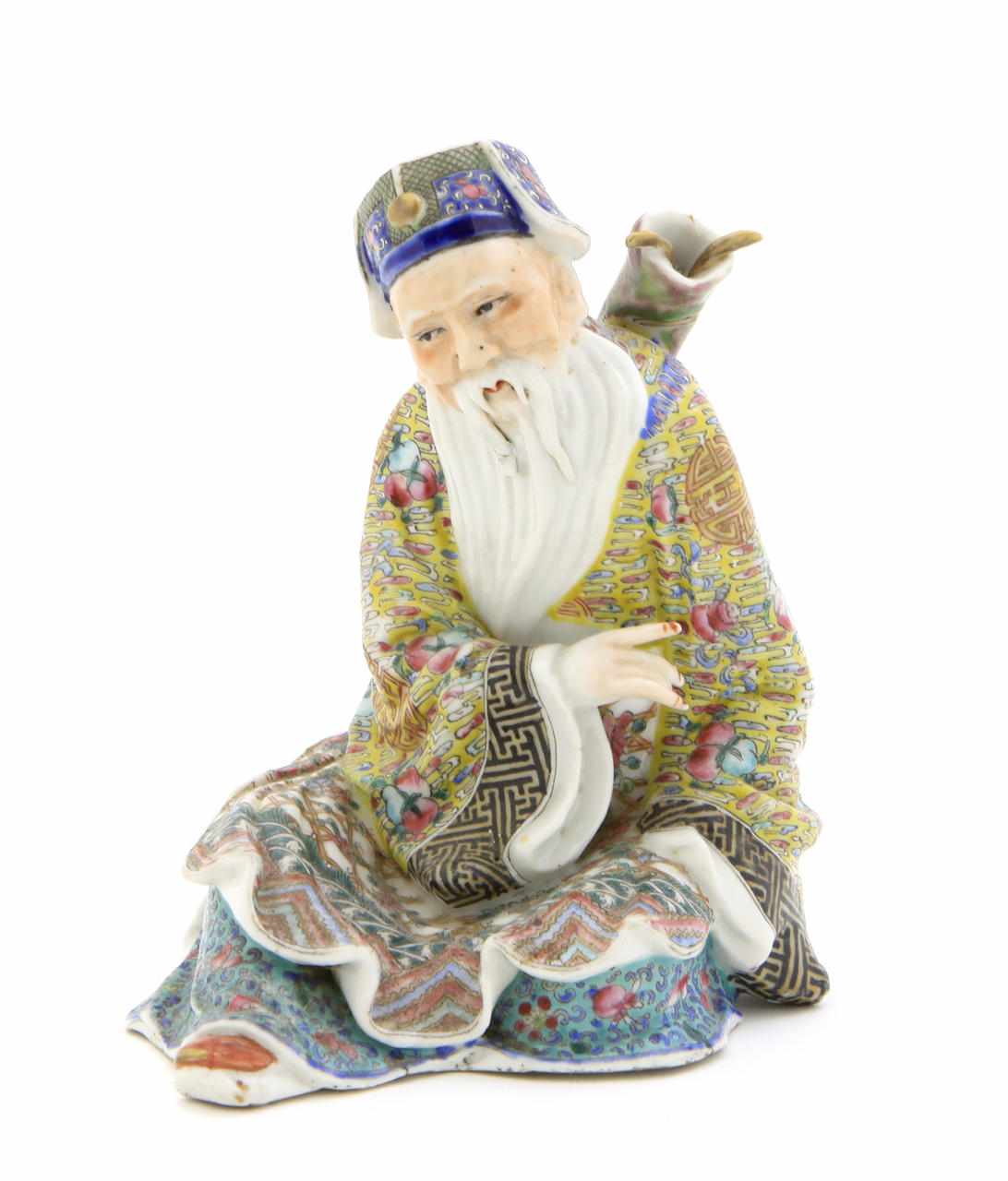 Appraisal: A Daoist enameled figure of an immortal height in diameter