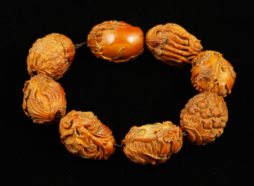 Appraisal: - Chinese Carved Olive Seeds Carved olive seeds China Qing