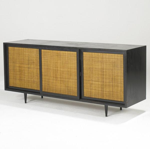 Appraisal: HARBEY PROBBER Ebonized three-door credenza with caned front and ebonized