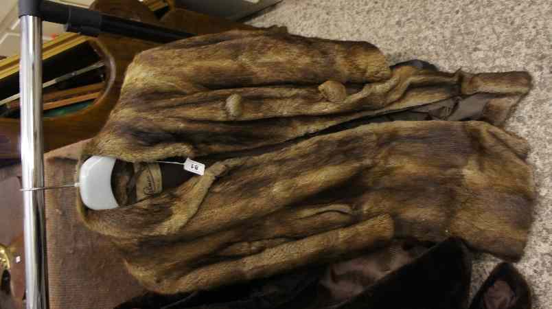 Appraisal: A Ladies Three Quarter Fur Coat with Large Buttons marked