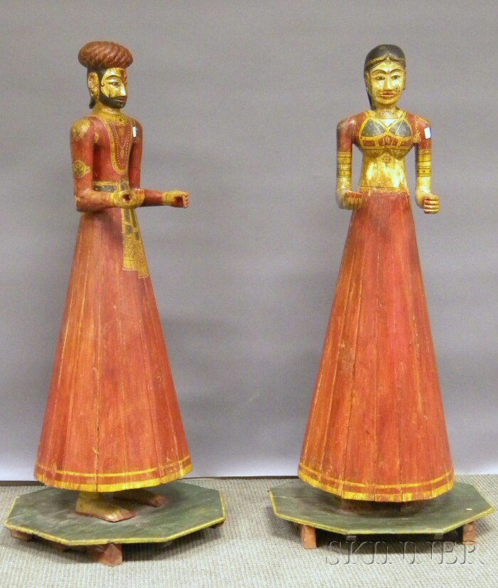 Appraisal: Pair of Indian Export Polychrome Paint-decorated Carved Wood Figures ht