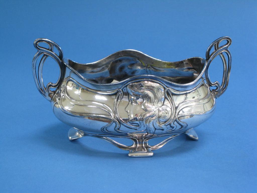 Appraisal: A WMF Art Nouveau two handled oval Bowl with female