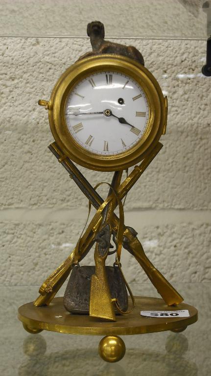 Appraisal: Novelty gilded brass desk timepiece the white dial within a